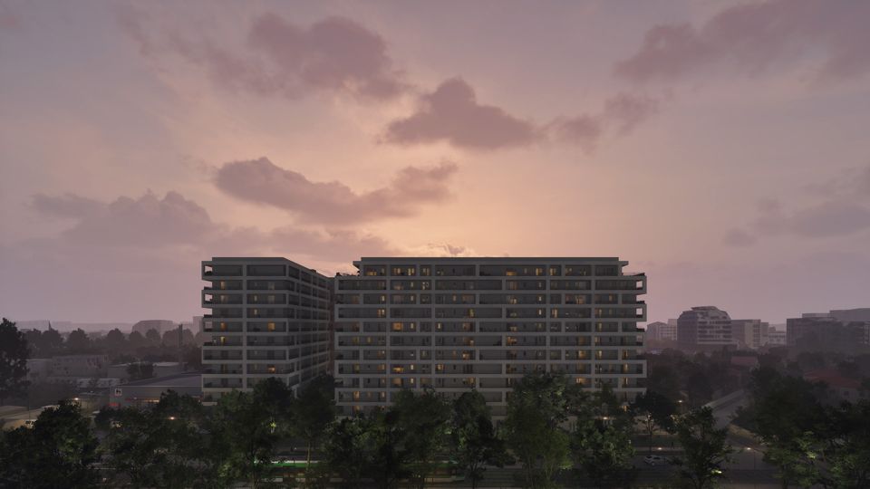 Render of a residential apartment block at dusk with lit windows against a pink sky